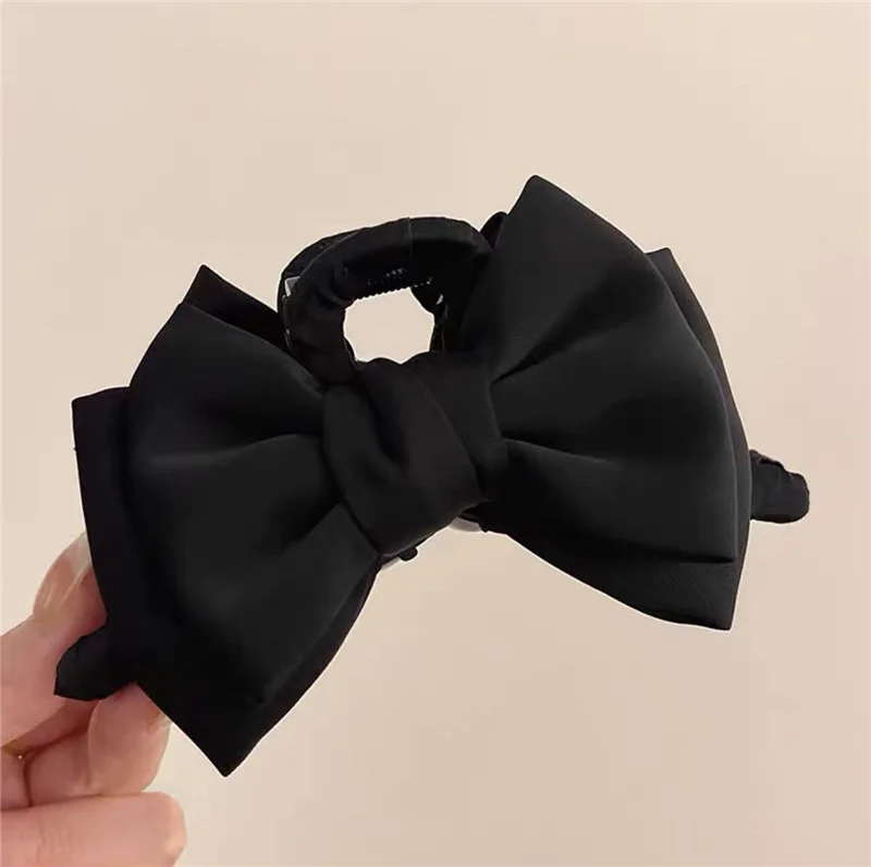 La pince Nœud — Noir